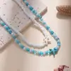 Collar Transfronterizo para Mujer de Alta Gama Verano Fresco Vida Marina Tortuga Estrella de Mar Doble Capa Cadena para Clavícula Cuentas de Arroz Apilamiento