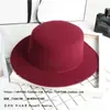 GD moderno casual sombrero de copa negro estrella mismo estilo sombrero de copa retro caballero estilo británico copa plana sombrero plano de tweed de copa plana para hombres y mujeres