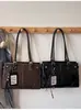 Bolso de mano retro brillante estilo coreano para mujer, nueva colección otoño/invierno 2026, moderno, gran capacidad, versátil, adecuado para ir al trabajo, bolso de hombro simple
