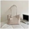 Bolso grande vintage de alta gama transfronterizo para mujer, nuevo bolso de mano de moda con patrón tejido, bolso de hombro súper popular de gran capacidad, moderno