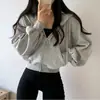 Ropa de alta gama para mujer de Dongdaemun, Corea, simple y elegante, diseño con capucha y cordón, chaqueta corta tipo sudadera holgada de manga larga
