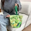 Venta al por mayor del fabricante Bolso de mano artístico de moda Bolso de lona Bolso tipo cubo de gran capacidad para mujer 2026 Nuevo Bolso para almuerzo de trabajo