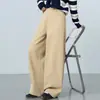 Pantalones de algodón lavado para mujer con pierna curva, nueva colección otoño 2026, 100% algodón con bolsillos laterales, adecuados para la oficina, con diseño de botón y estilo casual