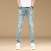 Tendencia de Moda 2026 Otoño Nuevos Jeans Elásticos Ajustados para Hombre Marca Trendy de Gama Alta Lavados Casuales Pantalones Largos