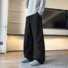 Calça de moletom desconstruída com barra curva imitação de caxemira para homens, marca da moda outono, calça longa casual versátil com caimento, calça esportiva de perna larga peso pesado
