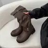 Otoño 2026 Nuevo Estilo Vintage Punta Redonda Tacón Grueso Botas de Caballero para Mujer Versátiles Caña Ancha Hebilla de Cinturón Tubo Alto Adelgazantes Botas Largas