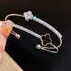 Pulsera Elegante de Lujo Ligero Transfronteriza de Alta Gama Incrustada de Diamantes para Mujer 2026 Nueva Popular Forma Redonda Personalizada Pulsera de Viaje Joyería