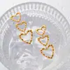 Pendientes Largos Dorados con Diseño de Corazón Hueco Simple Personalizados Estilo Europeo y Americano Moda Lujo Ligero Sentido del Diseño para Mujer