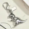 Varios Llaveros con Forma de Dinosaurio de Dibujos Animados, Flores y Corazones, Colgantes Únicos Lindos y Coloridos, Dijes Sencillos para Bolsos