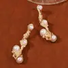 Pendientes ear studs aretes de moda europea y americana transfronterizos línea geométrica de perlas elegantes de lujo ligero combinan con todo personalizados