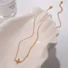 Europa y Estados Unidos collar cruzado nuevo transfronterizo acero inoxidable chapado en oro de 18 quilates incrustado con cristal joyería versátil mujeres