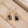 Pendientes colgantes de cristal negro con microincrustaciones de circonita, pendientes de lujo ligeros de alta gama, de diseño nicho.