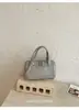 Bolsa pequena transfronteiriça de padrão trançado casual estilo coreano para mulheres, nova moda, bolsa de mão retrô de alto valor, bolsa de ombro e transversal