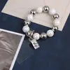 2023 Nuevo Estuche Portátil para Teléfono Móvil Cordón de Muñeca Cuerda Corta Cadena de Teléfono Móvil con Cuentas Joyería Listo para la Venta