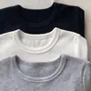 Camiseta de Menina para Primavera e Outono Bebê Estilosa Personalidade Infantil Tendência Versão Coreana Moda Cor Sólida Simples Irregular Camisa Base
