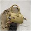 2025 Nuevo Estilo Coreano de Moda Simple Diseño de Nicho Bolso de Bowling para Viajar Dulce Elegante Moderno Bolso Cruzado para Mujer