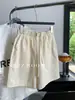 Shorts de Sarja Estilo Coreano Novo Primavera/Verão 2026 Algodão Puro com Cordão Shorts de Trabalho Soltos Emagrecedores Perna Larga Totalmente Algodão para Mulheres