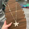 Colar Versátil Estilo Resort Sensação de Luxo para Mulheres Moda Leve Design de Luxo Corrente para Suéter Estilo Coreano Estrela do Mar Corrente de Clavícula Colar