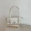 Bolso de axila de alta gama transfronterizo para mujer, nuevo modelo de moda versátil retro para el otoño de 2026, bolso de mano de lujo ligero