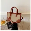 Bolso de axila popular transfronterizo de color contrastante para mujer, bolso de mano casual con decoración de hebilla metálica, bolso bandolera de un solo hombro de moda para el trabajo
