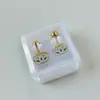 Aretes Mini Gota de Aceite Dorados de Acero de Titanio en Caja Aretes Sencillos de Tornillo Cuatro Hojas Pendientes de Marca Grande