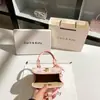 Bolsa de Caja Impresa de Lujo Estilo Alto Gama para Dropshipping 2026 Nuevo Bolso de Mano Versátil Impreso para el Día a Día Venta al por Mayor