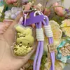 Venta al por mayor de Cadenas para Teléfono Melody Gold, Dijes para Bolsos y Llaveros Hechos de Oro Puro 999, Mismo Estilo que Shuibeike