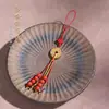 Nova Corrente de Telefone Tradicional Estilo Chinês Dourado Areia e Cinábrio com Pingente de Moeda Espírito da Montanha, Cordão de Telefone Estilo Nacional, Chaveiro de Bolsa, Pen Drive
