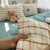 Conjunto de Quatro Peças de Gaze Dupla Nível Bebê e Materno Tipo Nuvem Classe A, Roupa de Cama Individual para Dormitório em Gaze de Algodão, Amigável à Pele e Adequado para Todas as Estações, Conjunto de Roupa de Cama de 4 Peças