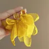 Brincos de Flor de Ráfia Agulha de Prata Estilo Férias na Praia Modernos Versáteis Brincos de Nicho Alto Padrão Transfronteiriços para Mulheres