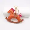 Colgante de Mochila Creativo Caballo Mecedora Boutique Colgante de Coche Cadena de Joyería Llavero de Caballo de Algodón Carrusel