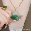Nuevo colgante imitación Jade Buda Maitreya Buda sonriente Buda de vientre grande collar Buda de alta calidad lujo ligero para mujer colgante para clavícula ropa