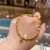 Nuevo Estilo Chino Tendencia Nacional Pulsera de Nudo de Bambú Cordón Elástico Ajustable Chapado en Oro Real En Vivo Venta Caliente