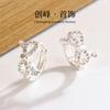 Pendientes de lazo de diamantes de moda 2024 con hebilla para la oreja, estilo femenino, ligeros, de lujo, sencillos, estilo frío.