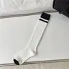 Calcetines de canalé a rayas horizontales para otoño e invierno, calcetines largos de estilo universitario japonés, calcetines hasta la rodilla de colores a juego de moda en Instagram