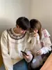 2025 Nuevo Estilo Otoño Estilo Perezoso Versátil Tejido Jacquard Retro Cuello Redondo Suéter de Punto para Hombres y Mujeres
