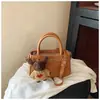 Color Sólido Nicho Casual Simple Moda 2026 Otoño Nuevo Elegante Personalidad Femenina Hombro Único Cruzado Pequeño Cuadrado Bolso