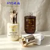 Botella de vidrio transparente de 30 ml con gotero de bomba de pétalo, fondo redondo, hombro plano, botella vacía para loción, cuidado de la piel y cosméticos