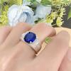 Anillo de diamantes en forma de huevo azul real dominante chapado en platino Moda europea y americana nuevo anillo de diamantes de cristal azul ovalado con incrustaciones