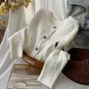Suéter de punto color hueso con bordado, chaqueta ligera de manga larga, nuevo diseño de otoño e invierno, elegante para ir al trabajo y fácil de combinar con otras prendas