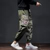 Outono e inverno de 2021 estilo chinês nova tendência masculina calças bordadas com dragão prateado calças de trabalho retrô personalizadas moda atacado