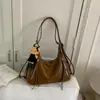 Bolsa Transfronteiriça 2026 Nova Coleção Primavera/Verão Super Tendência Popular para Mulheres, Design de Nicho Versátil Mochila Transversal Casual