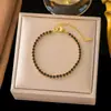 [Melhor Pulseira Estilo Quente 2] Temperamento Europeu e Americano High-End K Ouro Cruz Aço Titânio Pulseira Design Nicho Estilo Frio Mulheres