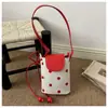 2026 Nuevo Bolso Cubo Retro de Alto Valor para Mujer Nicho Sensación de Alta Gama Bolso de Hombro Único Cruzado Bolso Sencillo Versátil para Teléfono