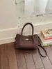 Bolso pequeño vintage transfronterizo para mujer, modelo nuevo 2026, bolso tipo cubo de alta gama, bolso cruzado de moda para el día a día
