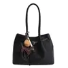 Bolso de mano retro simple para el día a día 2026 Nuevo estilo de primavera Textura de alta gama Casual y elegante Bolso de hombro y axila de lujo ligero