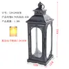 Estilo europeo hierro retro romántico adornos de candelabro lámpara de viento a prueba de viento de pie soporte para velas accesorios de boda linterna guía de camino