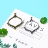 Accesorios de joyería de aleación NIANXING 30*37 mm pendientes cabeza colgante colgante poroso