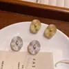 Pendientes Irregulares Ovalados de Metal Retro Estilo Francés, Versátiles y Elegantes, Lujo Ligero, Nicho, Gama Alta, Pendientes Plegados Personalizados