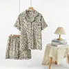 Roupa de casa feminina de crepe de algodão puro com estampa distribuída, manga curta e calça comprida para primavera e verão, pijama casual solto e confortável para casa